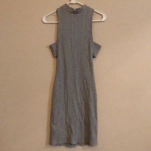 Sleeveless sweater dress with cutout side